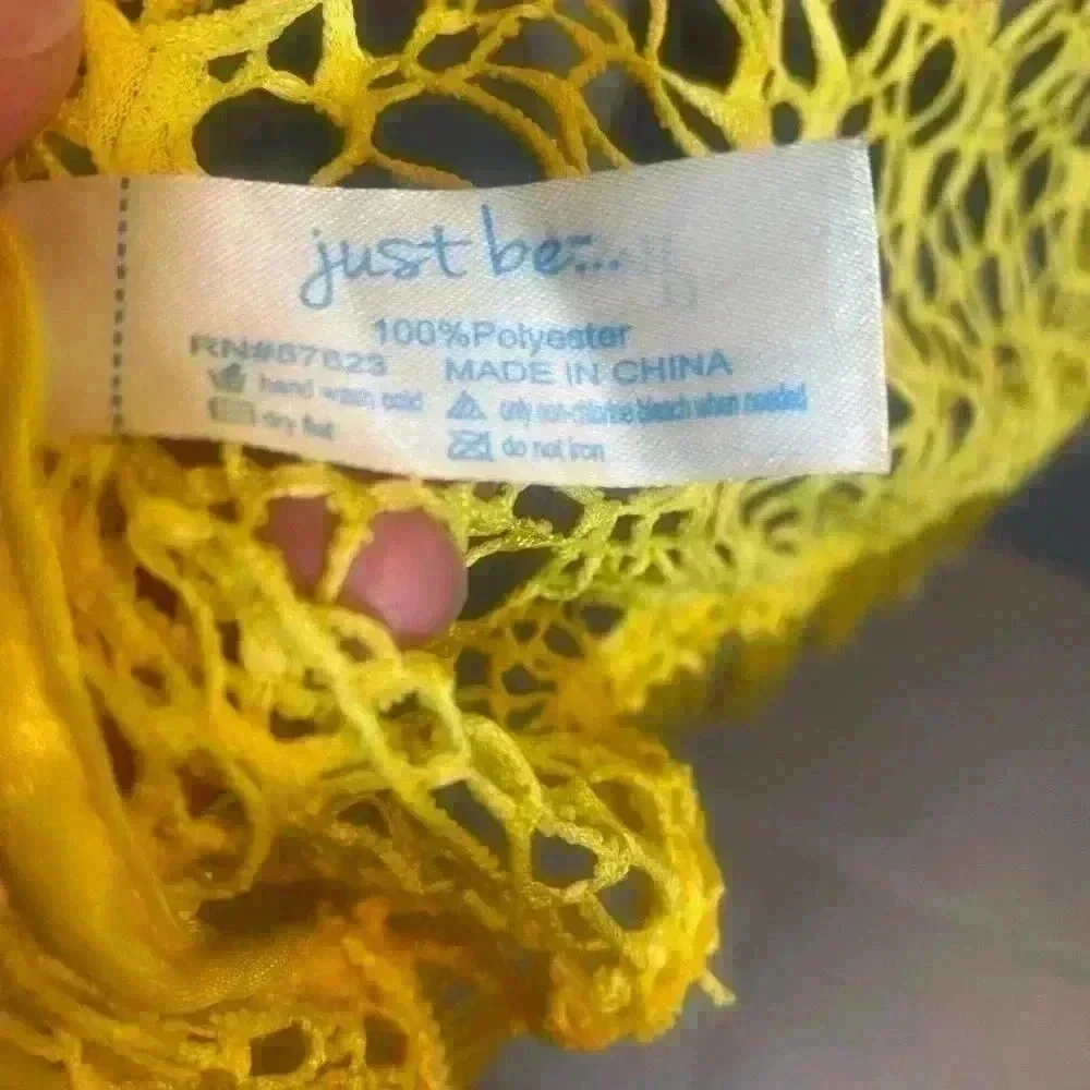 Yellow coverup for swimsuit or casual wear. Fits like a medium